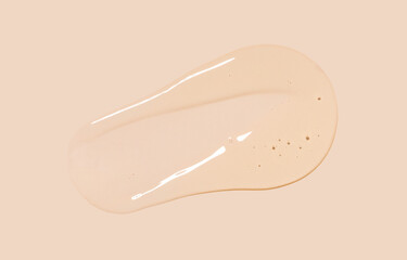 drop gel serum on beige background