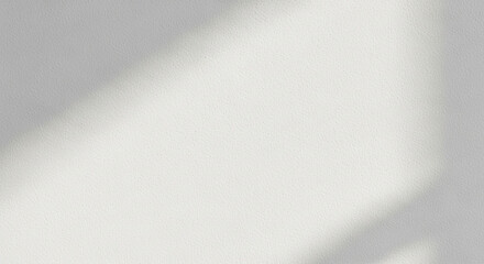 Brushed metal texture on a gray paper background with a shiny silver surface pattern