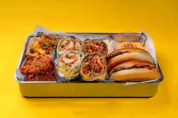 Set of American street food on yellow background