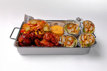 Set of burger, shawarma and french fries on a white background