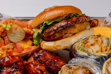 Set of burger, shawarma and french fries on a white background