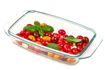 Cherry Tomatoes, Garlic, Basil in Glass Dish, isolated on white background