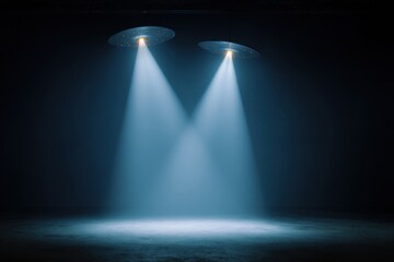 Two UFOs illuminate dark stage