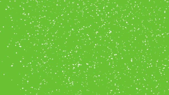 Falling snow on green screen background. Perfect for winter video overlays and festive visual effects.

