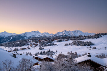 Scenic Alpine Ski Village at Sunrise in Winter