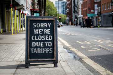 Sorry we're CLOSED due to tariffs. Foldable advertising poster on the street