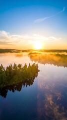 Obraz premium Sunrise over a lake, tranquil scene