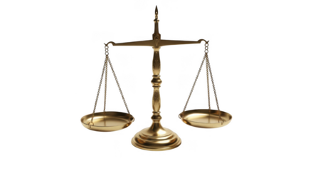 Antique brass balance scale against a stark black background