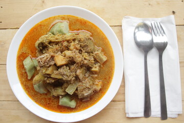 a plate of lontong lodeh
