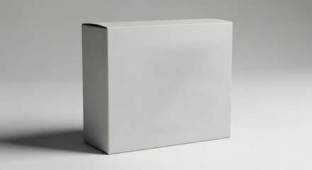 Blank white cardboard box on a neutral background, ready for product packaging design.
