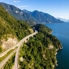 Scenic highway winding through mountains near a lake
