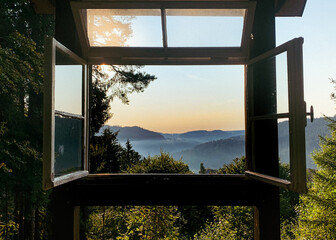 Open Window View of Serene Mountain Landscape at Sunrise In The German Black Forest