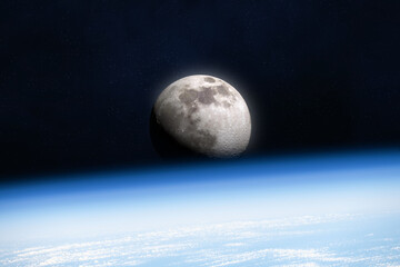 Earth and Moon. View on the Moon and planet Earth from space. The Earth in the foreground, Moon in...