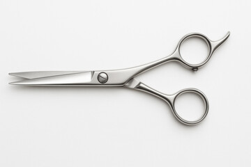 Obraz premium Professional hair cutting scissors with precise blades, designed for beauty salons, showcasing clean and sleek composition