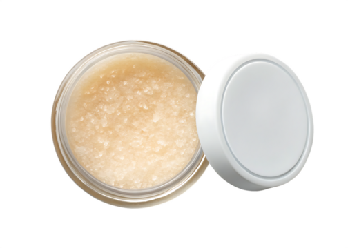 Open lip scrub jar with visible sugar grain texture isolated on a transparent background image