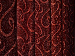 Textured Vertical Blinds with Swirling Pattern in Deep Red and Brown Tones.