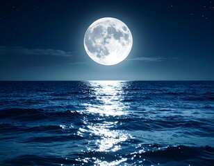 Full moon over a calm ocean at night, its light reflecting on the water's surface