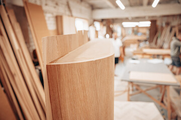 Curved Oak Wood Panel in Modern Carpentry Workshop