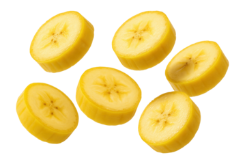 Fresh banana slices arranged randomly, showcasing their bright yellow color and smooth texture on transparent background.