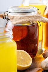 Colorful Kombucha Jars and Bottles on wooden table