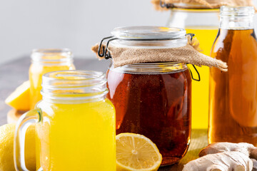 Colorful Kombucha Jars and Bottles on wooden table