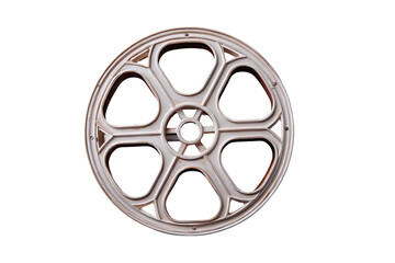 Vintage film reel.  A light beige or cream-colored film reel, circular, with a segmented design.  Each segment is arched with decorative details.  Isolated on black background