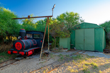  locomotive stopped in the workshop at Barril beach in the village of Pedras del Rei-Tavira-Algarve-Portugal.