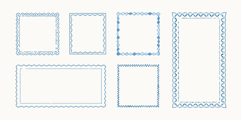 Collection of decorative blue borders and frames on a white background