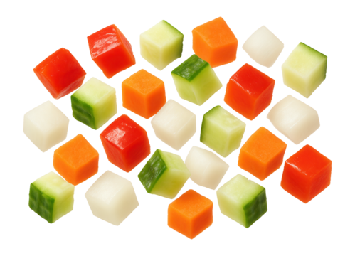 Assorted vegetable cubes including red pepper, cucumber, carrot, and onion on transparent background.