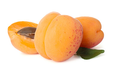 Fresh ripe apricots and green leaf isolated on white