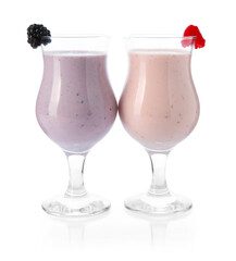 Different tasty milkshakes in glasses isolated on white