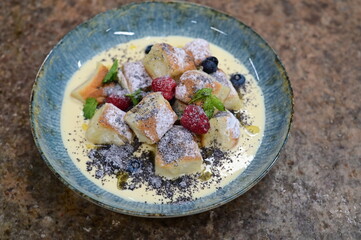 Traditional Czech dessert, sweet baked buns with vanilla cream