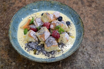Traditional Czech Vanilla Buchticky with Sweet Milk Sauce, Fruit and Poppy Seeds