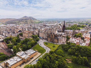 Edinburgh Scotland: 18th May 2025: Drone view of Princes Street in Edinburgh showcasing city life and architecture. Edinburgh Waverley
