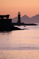 Vigo Lighthouse with the Cies Islands in the background at sunset