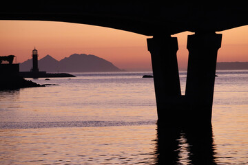 Vigo lighthouse with the Cies islands in the background at sunset