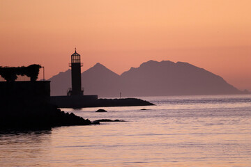 Vigo Lighthouse with the Cies Islands in the background at sunset