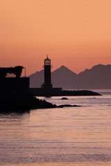 Vigo Lighthouse with the Cies Islands in the background at sunset