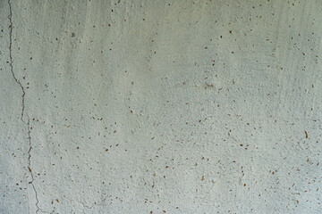 Close-up view of textured concrete in an ancient Central European village Muted color palette, ambient lighting, no distinct objects or markings