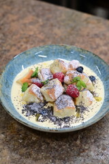 Traditional Czech dessert, sweet baked buns with vanilla cream