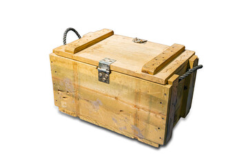 Vintage metal travel trunk with rust and wear, resting on an uneven surface Rectangular shape, top straps for secure lid, handle at top left corner