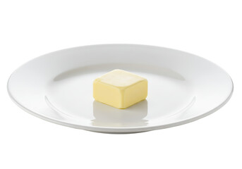 Isolated Butter Cube on a White Plate for Culinary and Recipe Purposes