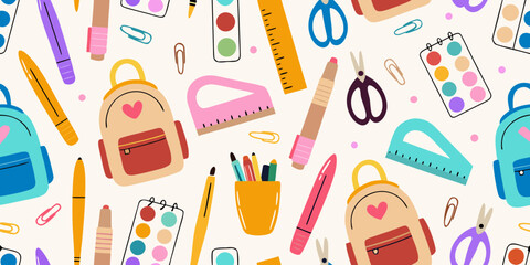 Colorful school supplies and backpacks pattern