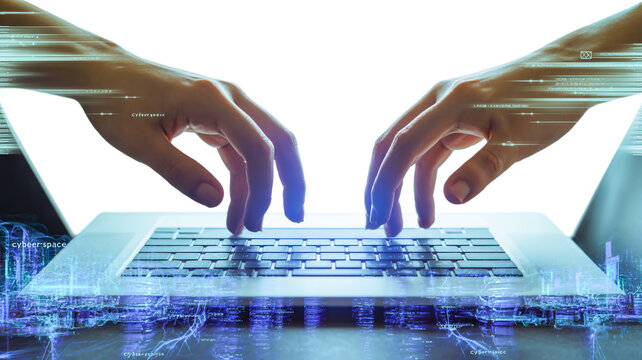 A digital composite image of hands typing on a laptop keyboard overlaid on a holographic cityscape background. - Powered by Adobe