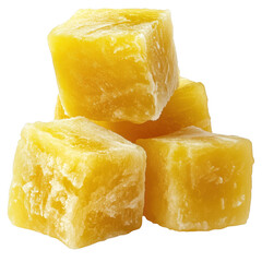 Close-up view of frozen yellow mango cubes piled together against a transparent background