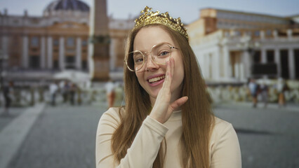 Princess wearing golden crown and glasses holding hand to mouth for whisper in vatican building;...