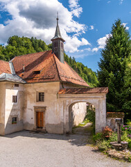 Charming Old Building with Bell Tower in Scenic Landscape