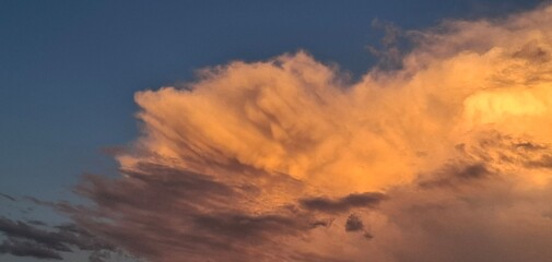evening time, dark clouds in the sky illuminated by the sun, sunset, summer season