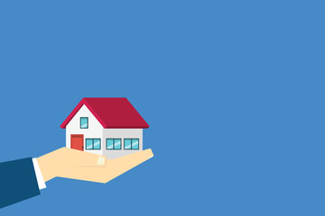 Hand holding house	