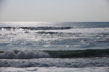 Sunny day on the ocean shore. Summer seascape